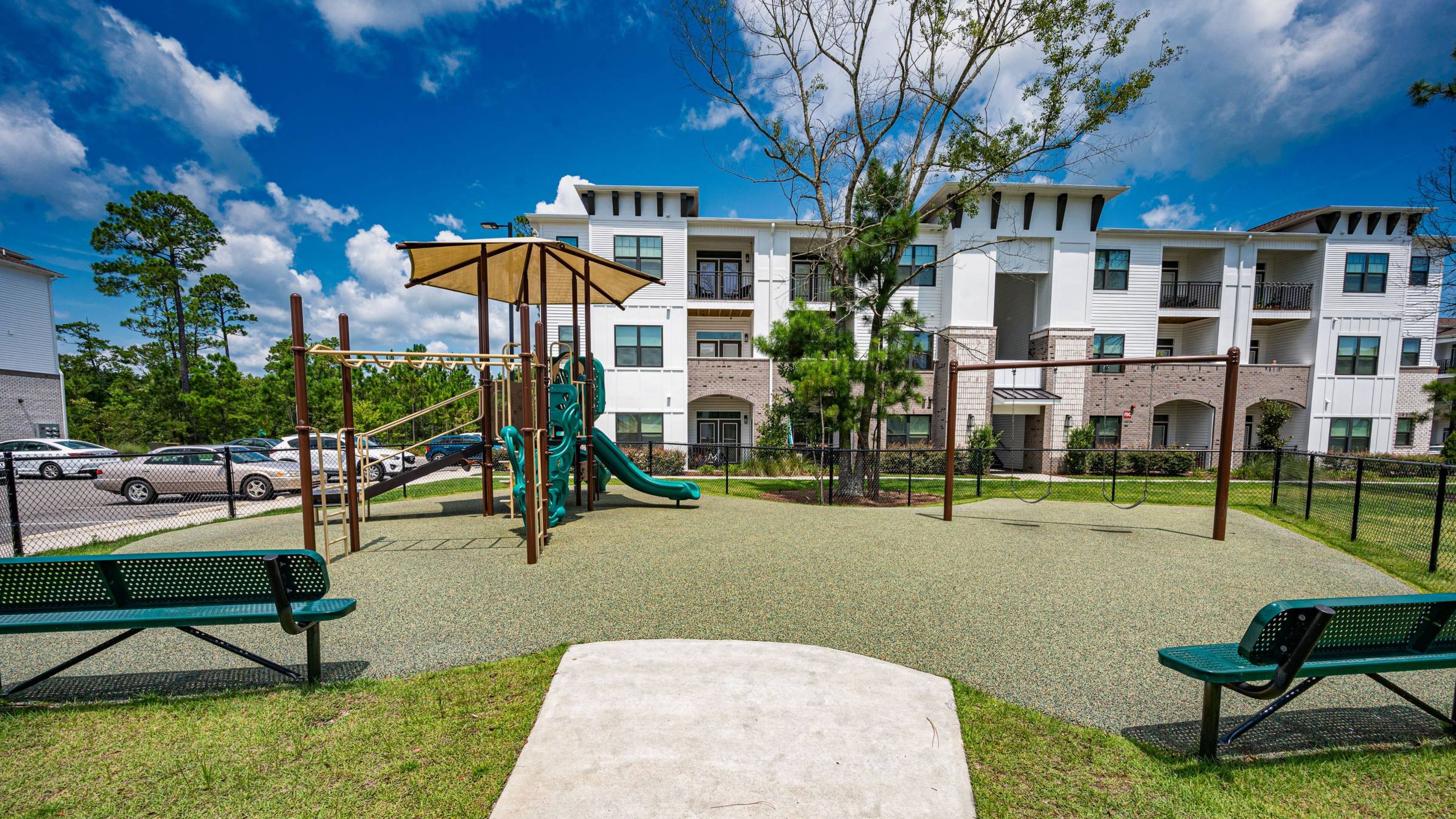 Hawthorne at Smith Creek outdoor playground space with surrounding greenery